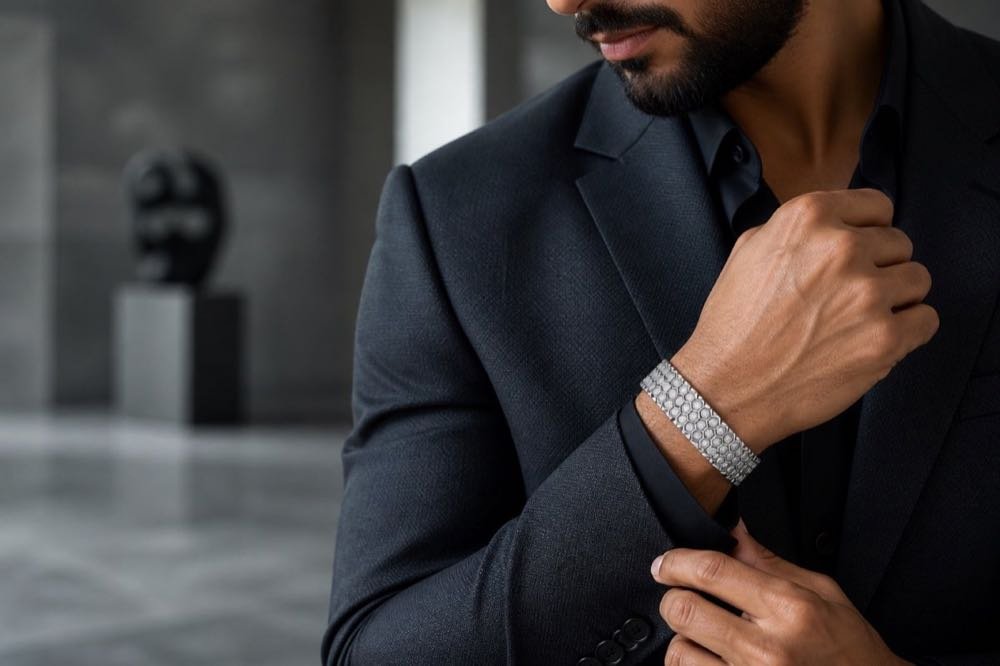Silver stone-set bracelet styled with a tailored jacket