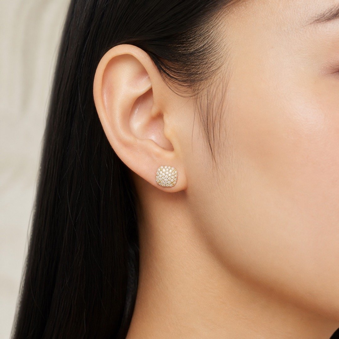 Gold over 925 Sterling Silver Cushion Pavé Moissanite Stud Earrings — close worn view Gold over 925 Sterling Silver Cushion Pavé Moissanite Stud Earrings — close worn view
