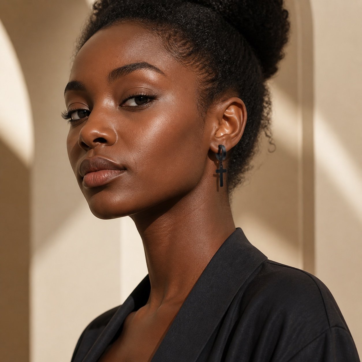 black finish stainless steel cross earrings — portrait view Black-Finish Stainless Steel Cross Earrings — portrait view