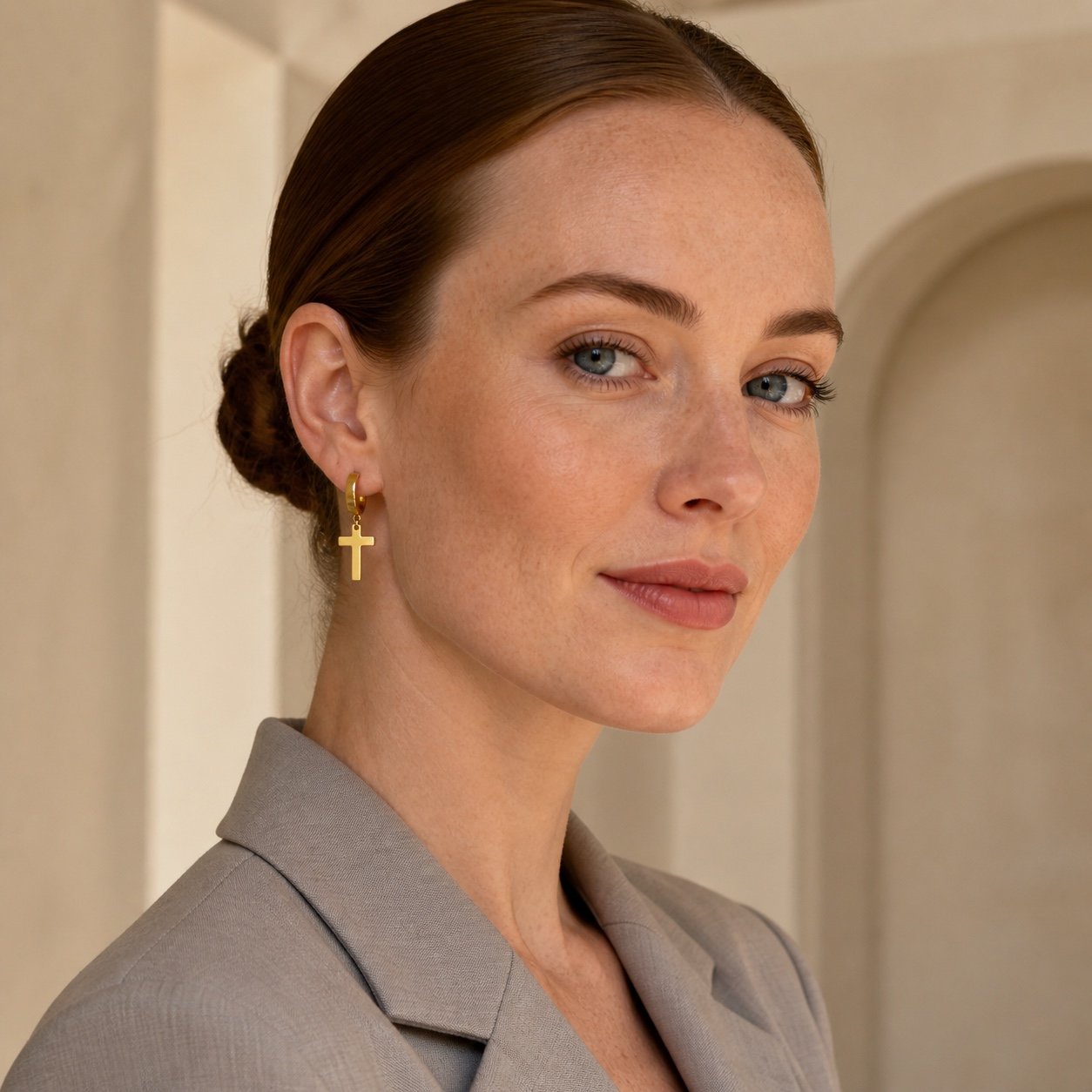 Gold-Finish Stainless Steel Cross Earrings — portrait view Gold-Finish Stainless Steel Cross Earrings — portrait view
