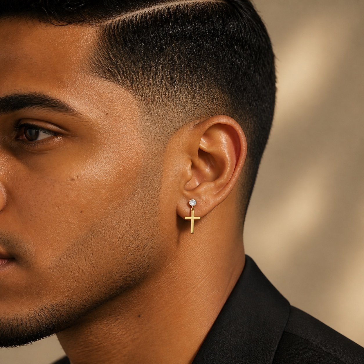Gold-Finish Stainless Steel Cross CZ Stud Earrings — close worn view Gold-Finish Stainless Steel Cross CZ Stud Earrings — close worn view