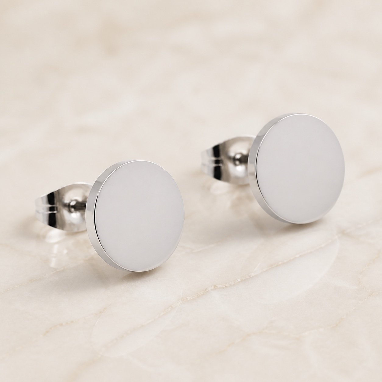 10mm Polished Stainless Steel Round Stud Earrings — product view 10mm Polished Stainless Steel Round Stud Earrings — product view
