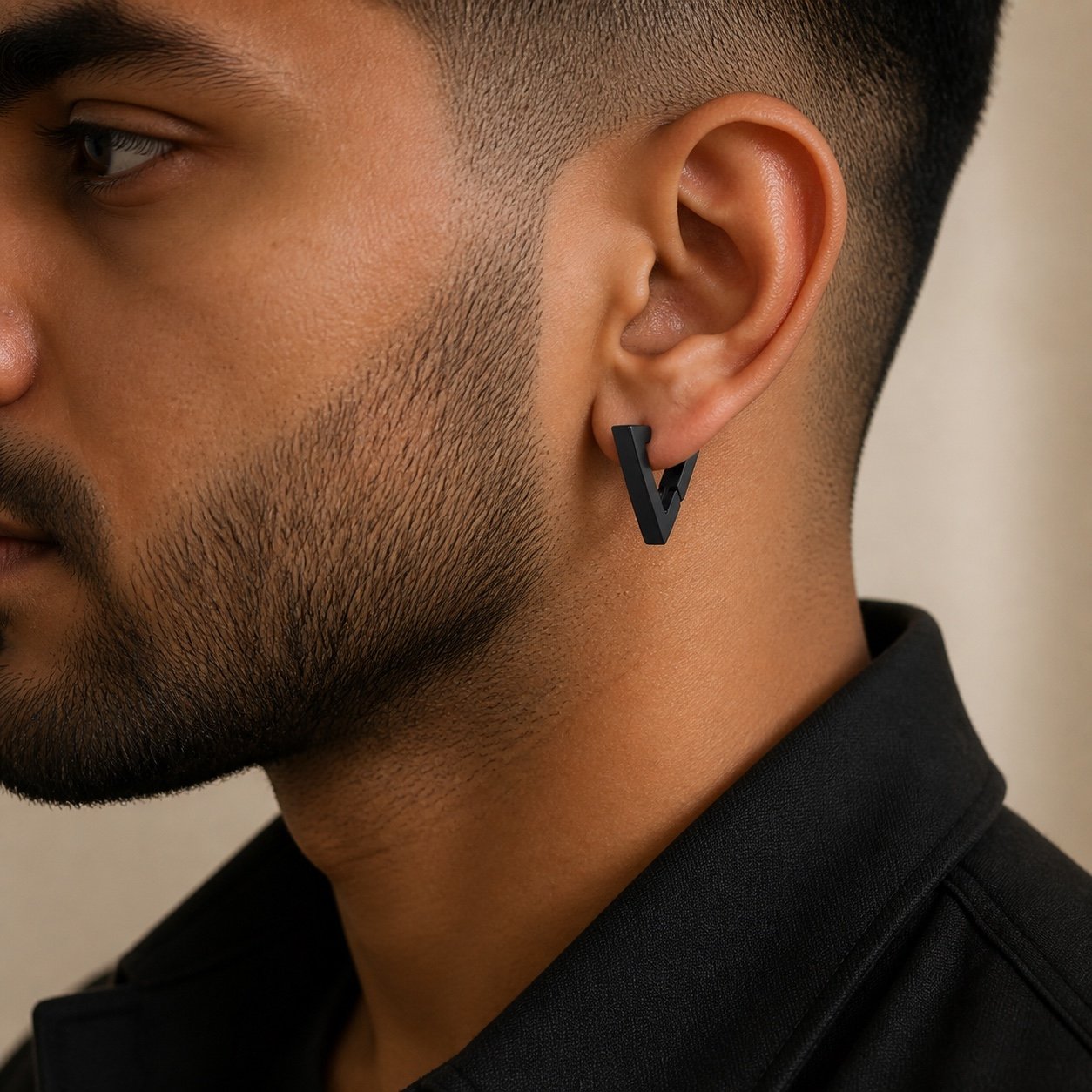 Black-Finish Stainless Steel Triangle Hoop Earrings — close worn view Black-Finish Stainless Steel Triangle Hoop Earrings — close worn view
