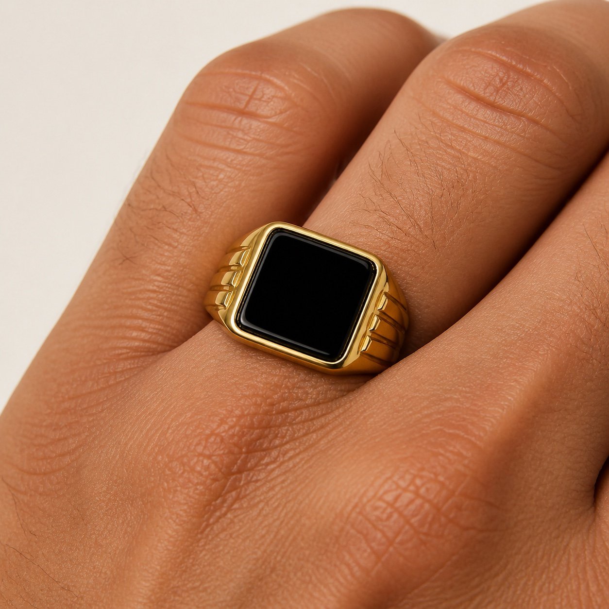 Gold-Tone Black Onyx Signet Ring — close worn view Gold-Tone Black Onyx Signet Ring — close worn view