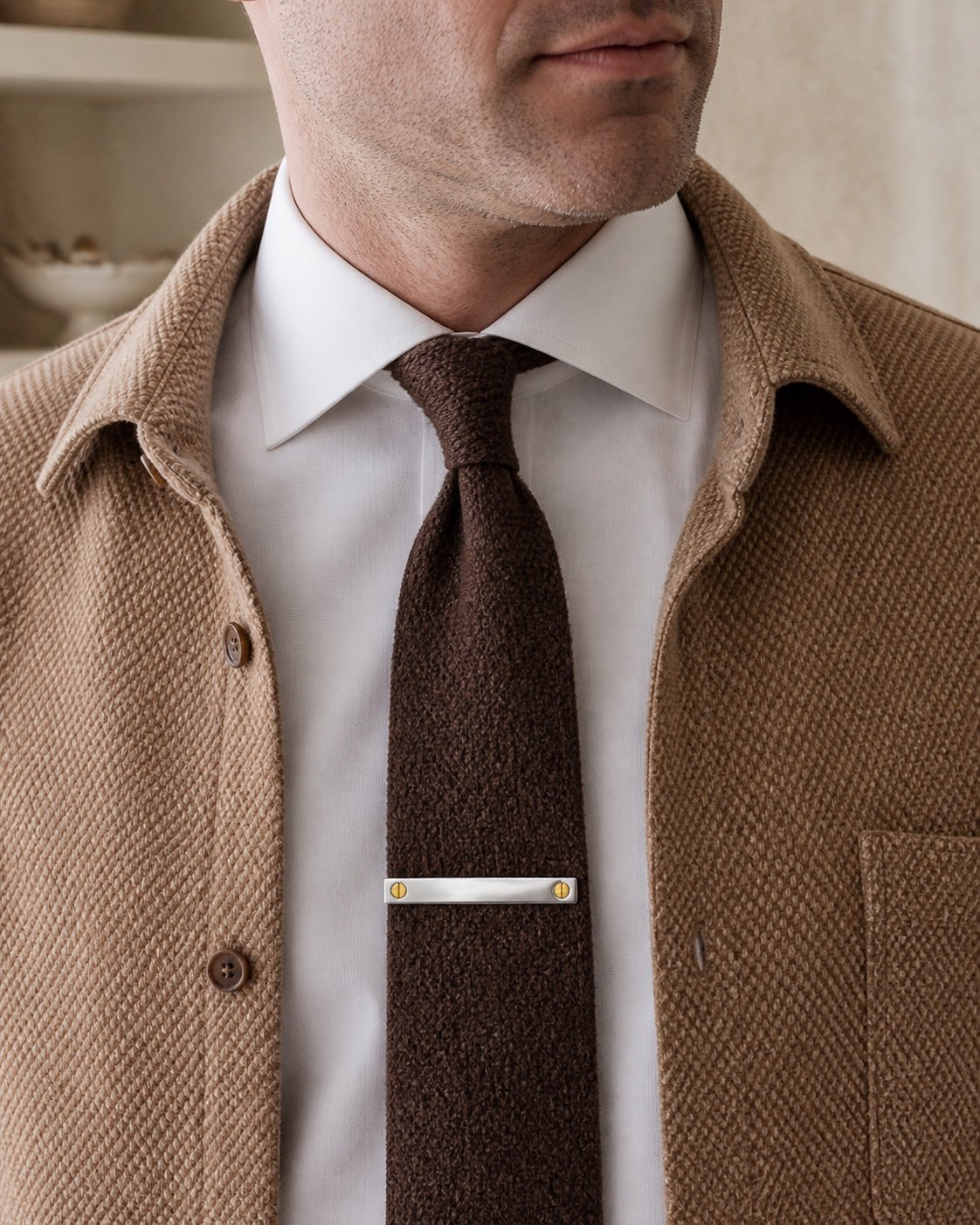 Polished Tie Clip with Gold Screw Accents — detail view Polished Tie Clip with Gold Screw Accents — detail view