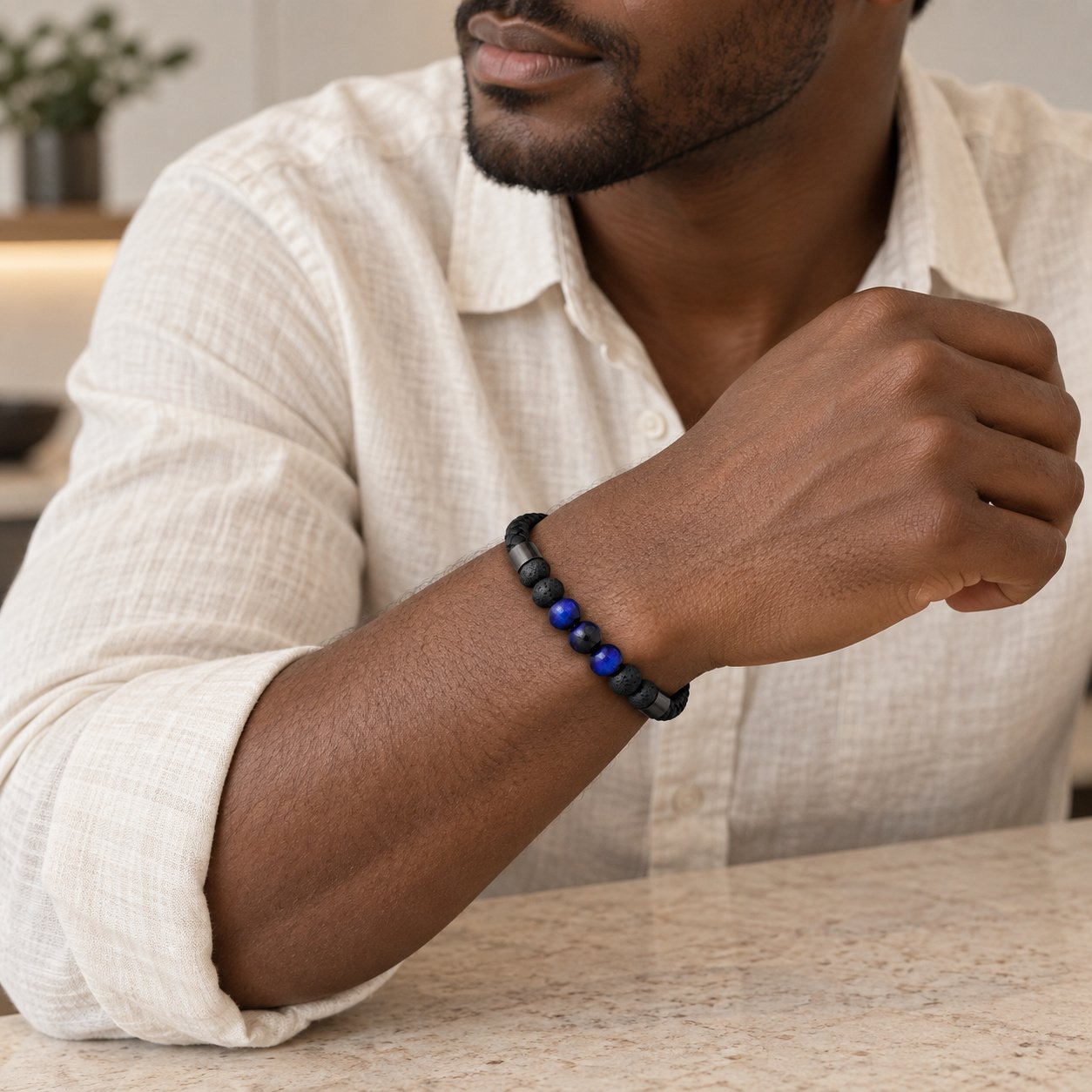 blue tiger eye & lava bead leather bracelet — medium lifestyle view Blue Tiger Eye & Lava Bead Leather Bracelet — medium lifestyle view