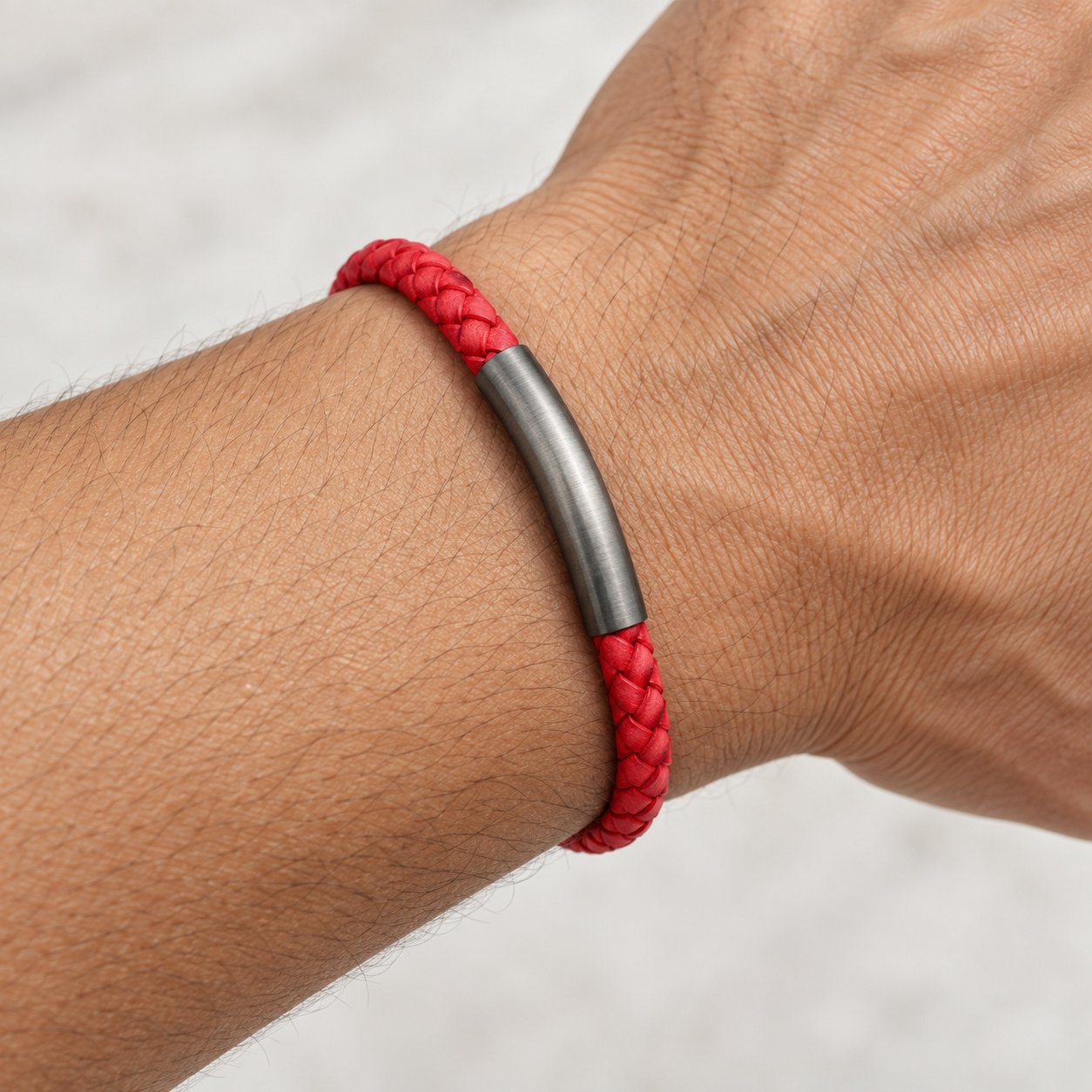 red leather & gunmetal bar bracelet — close worn view Red Leather & Gunmetal Bar Bracelet — close worn view